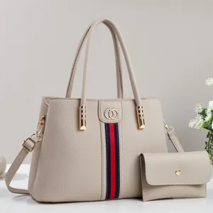 Elegant beige PU leather tote handbag set for women, featuring chic striped design and wallet.