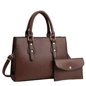 Classic brown tote bag set for women with adjustable shoulder strap and matching clutch purse.