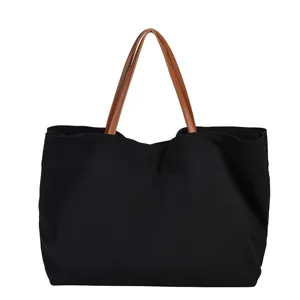 Large capacity canvas tote bag for women, casual commuting shoulder handbag and student bag.