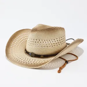 Gedetailleerd overzicht van de vintage strooien cowboyhoed met gevlochten textuur en oogdecoratie.