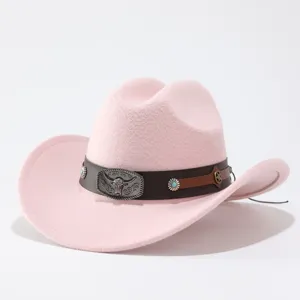 Charming pink wool felt cowboy hat featuring a vintage brown belt and metal bull skull buckle.