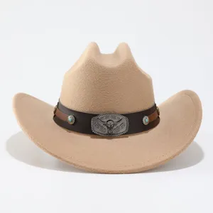 Felt western cowboy hat detail shot featuring metal bull skull buckle and turquoise stone decor.