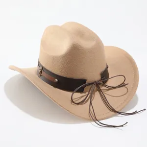Detailed view of the khaki felt cowboy hat with leather band and star buckle accent.