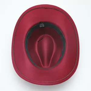 Detail view of a stylish red woolen felt fedora jazz hat, featuring an inner size label.