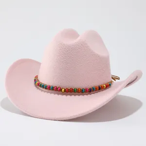 Pink wool western cowboy hat with colorful beaded band detail for women and men fashion.