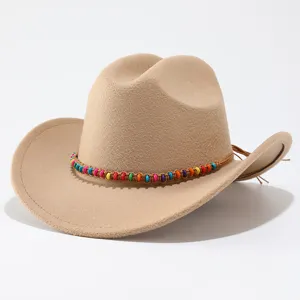 Detailed view of a stylish felt cowboy hat featuring colorful beaded band and rolled brim design.