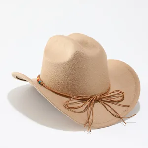 Detail view of a beige wool felt western cowboy hat with beaded rope and rolled brim.