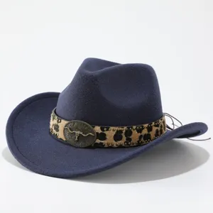 Close-up of navy blue wool felt western cowboy hat featuring leopard print band and bull skull.