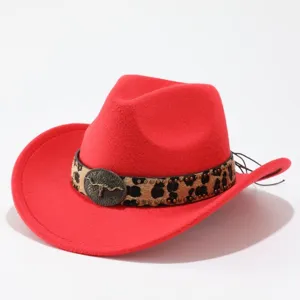 Red wool cowboy hat detail shot featuring leopard print band and vintage metal bull skull buckle.