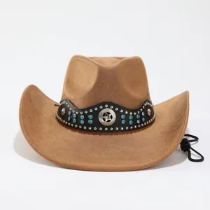 Close-up view of brown western cowboy hat with rhinestone studded leather band and star emblem.
