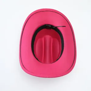 Pink felt western cowboy hat detail view showing inner lining, size 57 and polyester material.