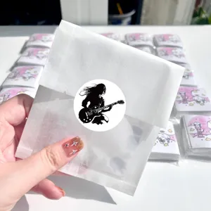 Pack d'autocollants ronds de musique rock avec silhouette de guitariste punk pour guitare.