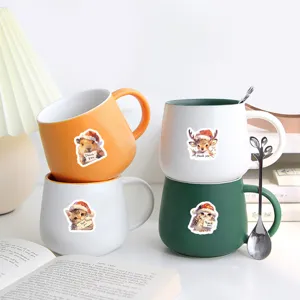 Ceramic coffee mugs set with Christmas animal prints, ideal for holiday gifts and daily use.