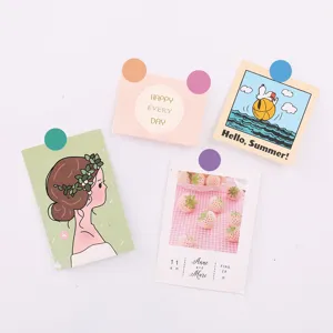 Close-up of macaron color dot marker stickers on decorated index cards for office.