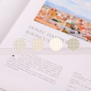 Detailed view of minimalist grid dot planner stickers for journal decoration and DIY notes.