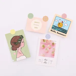 Detailed view of minimalist decorative sticky notes featuring cute illustrations and stickers.