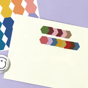 Close-up detail of colorful hexagonal index sticky notes, perfect for textbook page marking.