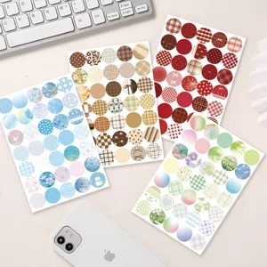 Detail view of multi-color circular planner stickers sheets, perfect for bullet journals.