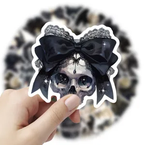 Detailed close-up shot of a gothic style black lace bow skull waterproof sticker.