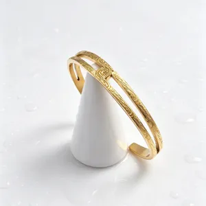 Gold plated titanium steel Hawaiian vine scroll cuff bracelet, retro minimalist open bangle for women.