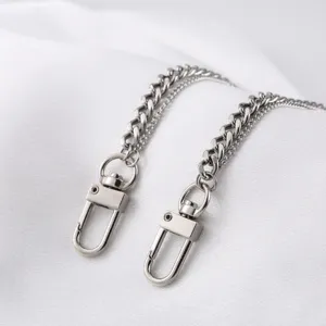 Close-up view of the double layer stainless steel Cuban chain pants detail shot.