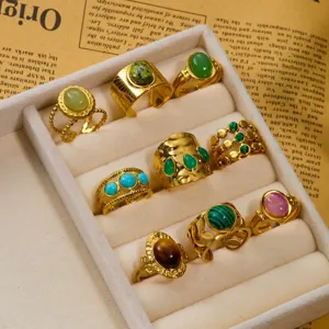 Vintage 18k gold plated irregular lava gemstone stacking rings closeup detail view.