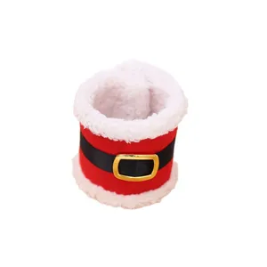 Details of the Christmas napkin ring featuring a festive red and white faux fur design.
