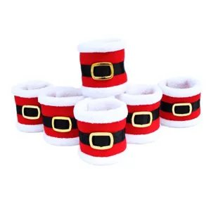 Christmas Santa belt napkin rings set, red and white holiday table decor for dinner party.