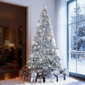 Frosted artificial Christmas tree with warm lights and silver ornaments for holiday decor.