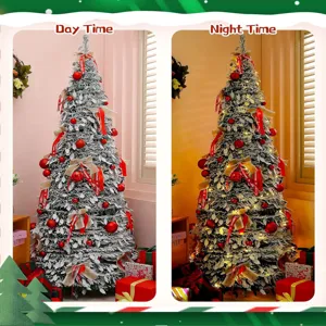 Detailed view of the collapsible artificial Christmas tree with red balls and warm lights.