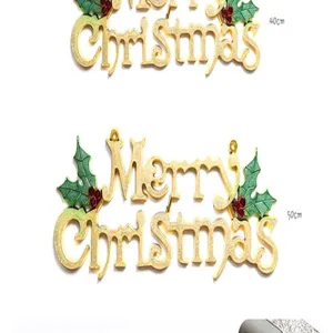 Gold Merry Christmas hanging sign with holly leaves, perfect for holiday tree decor.