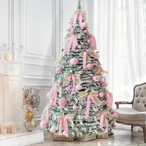 Detailed view of a foldable pink Christmas tree with lovely ribbons and ornaments for holiday decor.