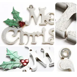 Gold Christmas letter hanging ornament with glitter finish and holly leaves for tree decor.