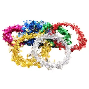 Colorful Christmas tinsel garland with stars for holiday tree and party hanging decoration.