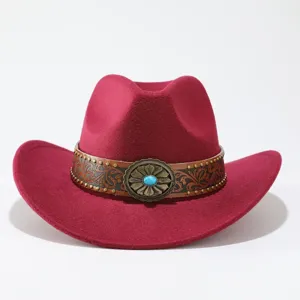 Close-up of the vintage tooled leather band and turquoise concho detail on the red wool felt hat.