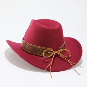 Close-up detail of the vintage wool felt jazz hat featuring patterned leather band and studs.