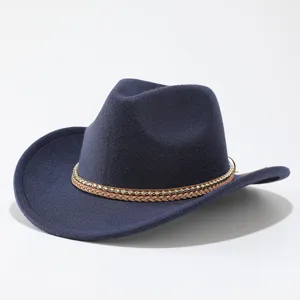 Detailed view of dark blue western cowboy hat with rhinestone braided band, felt fedora closeup.
