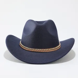 Close-up detail of dark blue western cowboy hat with braided strap and metal chain trim.