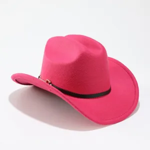 Close-up view of the pink felt western cowboy hat featuring a black band and gold chain detail.