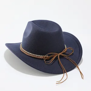 Detail view of the navy blue felt western cowboy hat with braided strap and rhinestone accent.