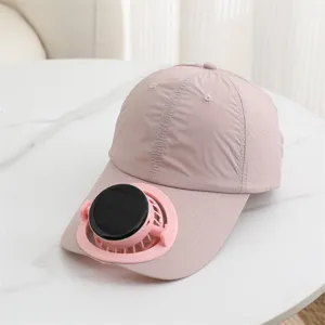 Close up of the pink sun hat featuring a built-in solar powered mini fan for cool summer use.