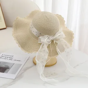 Strohoed met bloemen kant strik brede rand strand hoed zomer vakantie stijl hoed
