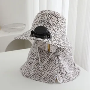 Detail view of floral sun hat with solar powered fan and neck flap for outdoor sun protection.
