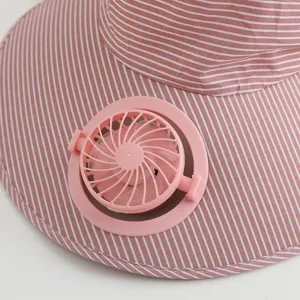 Detail view of women striped sun protection hat featuring a built-in mini pink rechargeable fan.