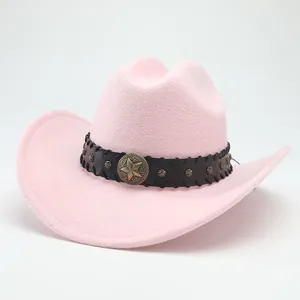 Pink western cowboy hat detail closeup with black studded leather band and metal star accent.