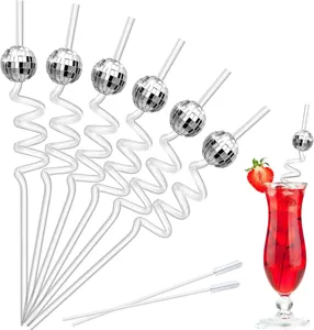 Detail shot of party disco ball straws and cleaning brush set for bar and drink decoration.