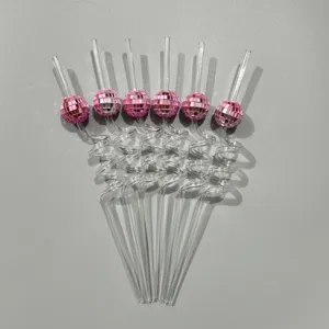 Pink disco ball curly straws detail shot, perfect for party celebration drinks and bar accessories.