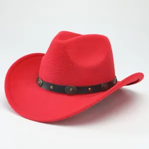 Detail view of the red western cowboy hat, featuring a black studded band and rolled brim design.