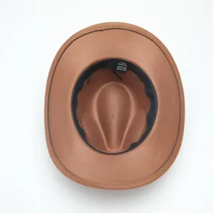 Brown fedora jazz hat interior detail showing size and material tag for adults.