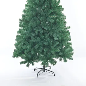 Detailed view of dense artificial PVC Christmas tree with sturdy metal stand for holiday decor.
